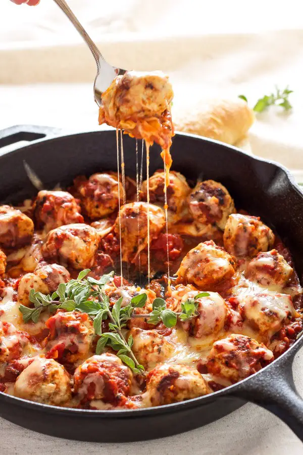 Easy To Make Turkey Meatballs Stuffed With Mozzarella Cheese And Simmered In Marinara Sauce