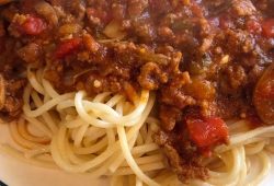 Meaty spaghetti sauce with ground beef over spaghetti