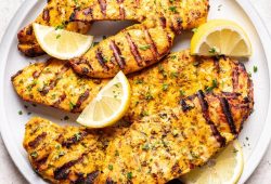 Juicy yogurt marinated chicken breasts with lemon, by Laney Schwartz