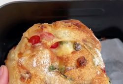 Golden air fryer ciabatta loaf filled with vegetables