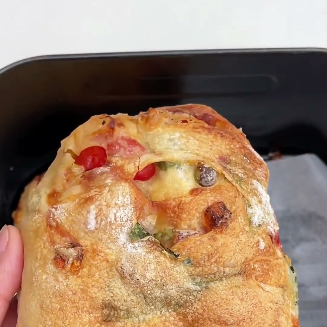 Golden air fryer ciabatta loaf filled with vegetables
