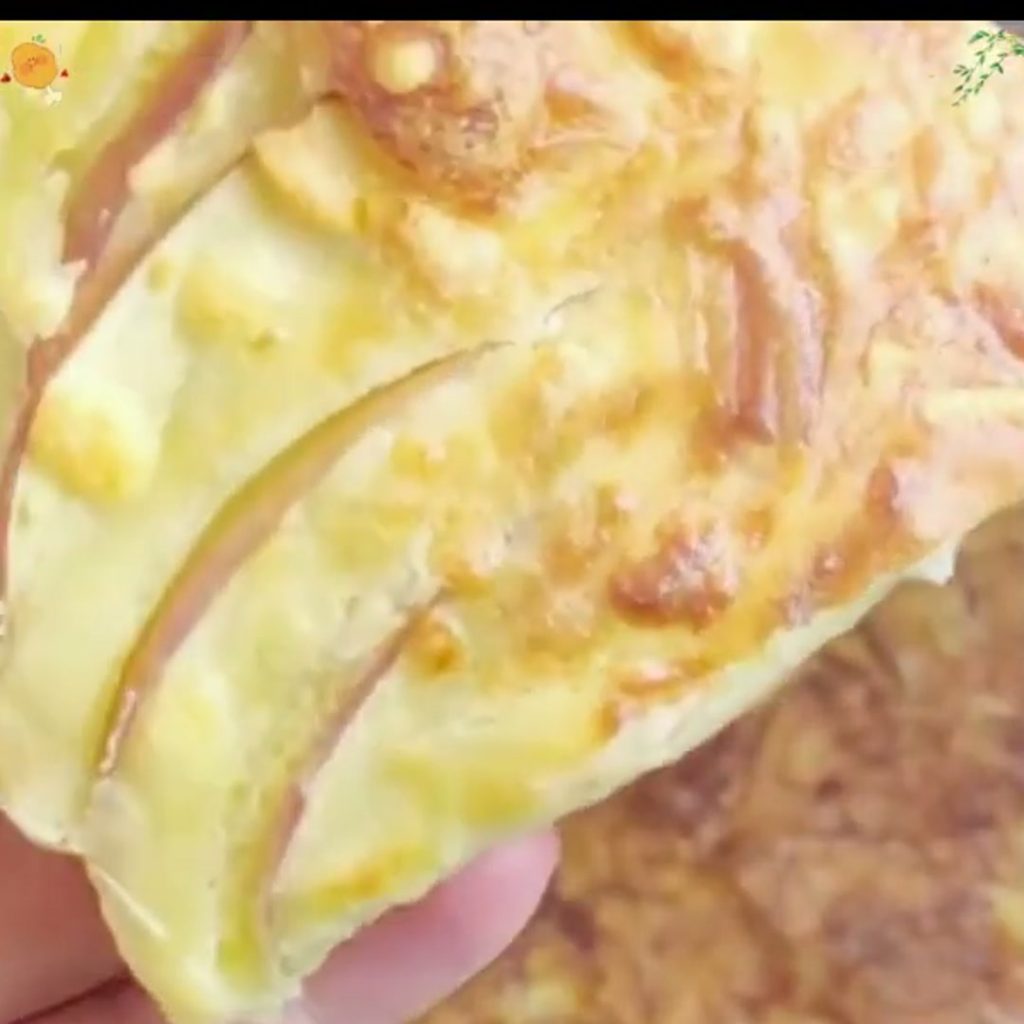 Golden air fryer apple cake with thin apple slices and a cheese crust