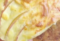 Golden air fryer apple cake with thin apple slices and a cheese crust