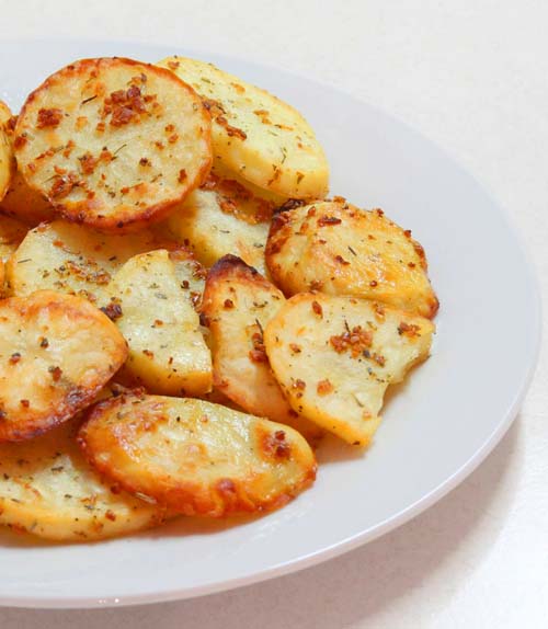 The Best Tasting Oven Baked Garlic Potato Slices Ever