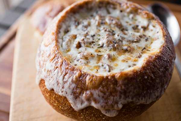 Warm Up With A Philly Cheesesteak Stew In A Bread Bowl